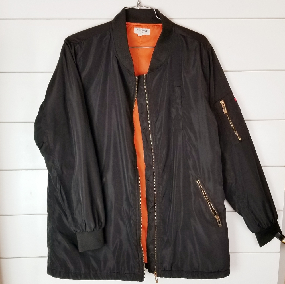 Cali Love and orange bomber jacket